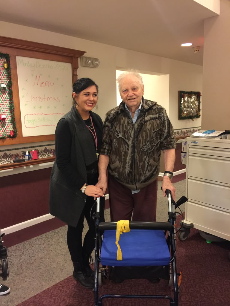 Resident and caregiver at Prairie Gardens Assisted Living